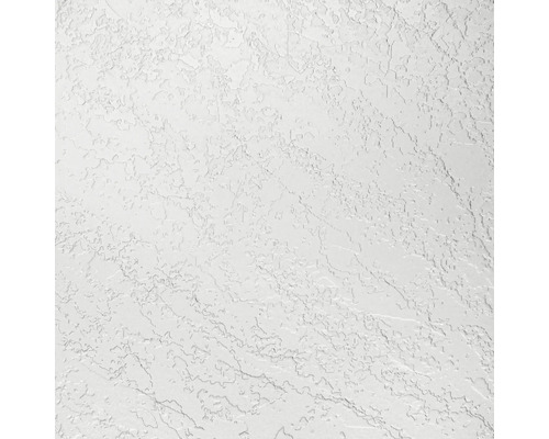 Close-up van een witte muur met stucwerk