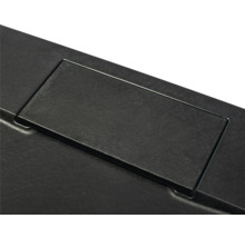 Detailopname van een verzonken, rechthoekig tafelcontactdoos.