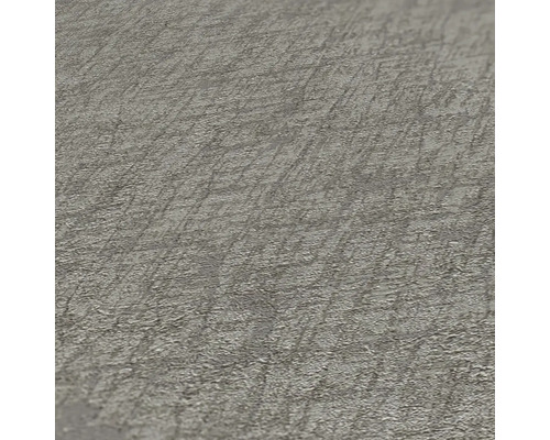 Close-up van een grijs structuurbehang.