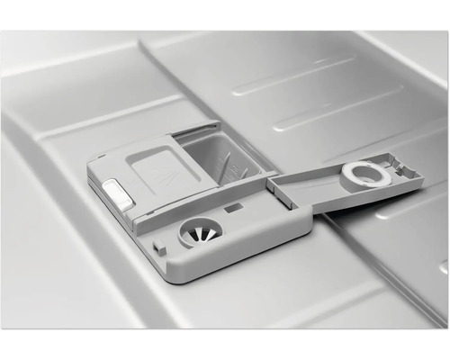 Detail van een vaatwasser met open reinigingsmiddel compartiment