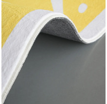 Detail van een tapijt met een textiele rand