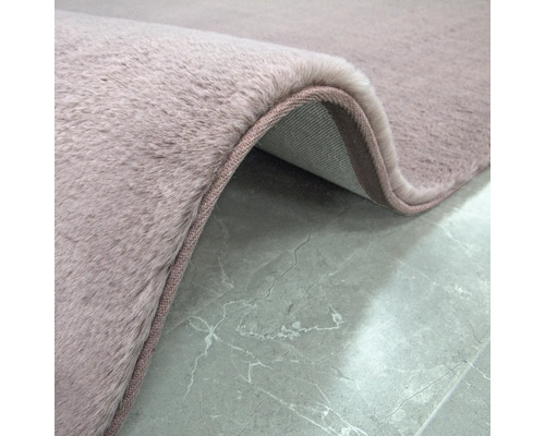 Detailopname van een vloerkleed met pool