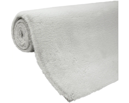 Opgerolde, zachte vloerbedekking