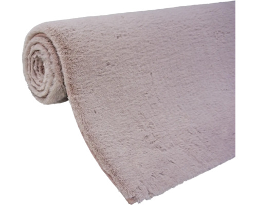 Opgerolde hoogpolige vloerkleed