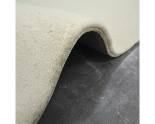 Detailweergave van een beige tapijt