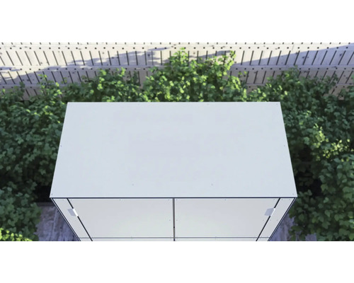 Bovenaanzicht van een tuinhuis met planten op de achtergrond