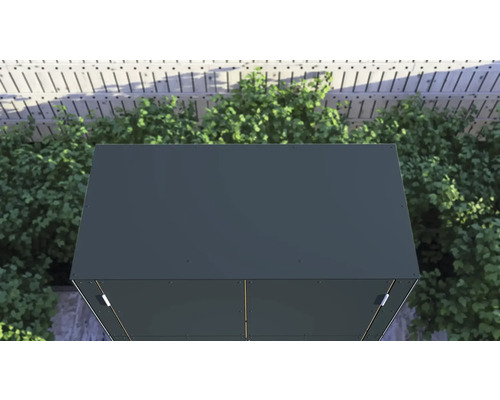 Bovenaanzicht van een tuinhuis met metalen dak