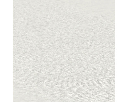 Close-up van een wit textielbehang met fijne structuur