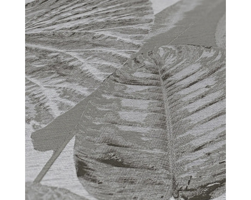 Close-up van een gestructureerd behang met bladerpatroon