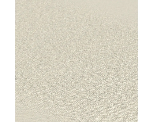 Close-up van een beige vinylbehang met lichte textuur