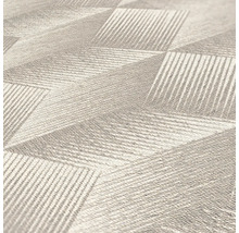 Close-up van een gestructureerd behang met geometrische patronen