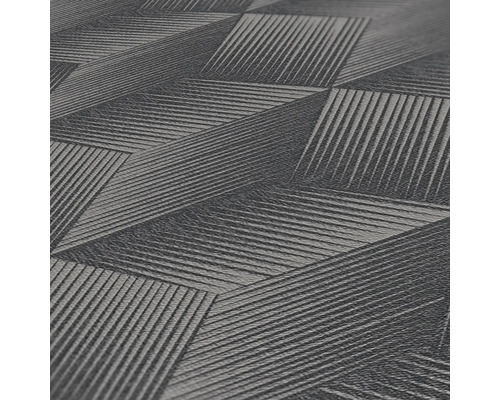 Close-up van een gestructureerd behang met geometrisch patroon