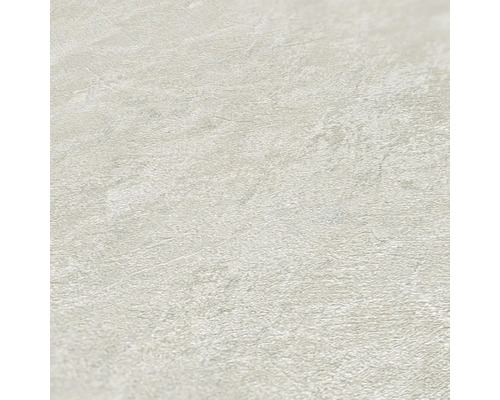 Close-up van een licht vinylbehang met steeneffect.