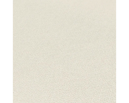 Detailopname van een lichtgekleurd behang met textielstructuur