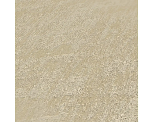 Close-up van een beige structuurbehang.