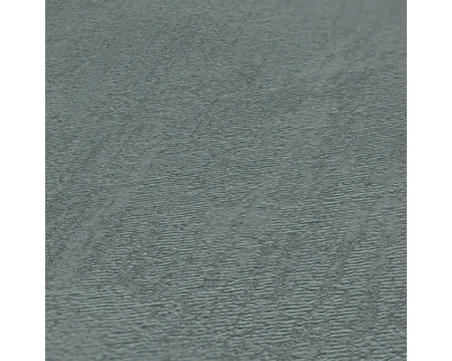 Detailopname van grijs vinylbehang met lichte structuur