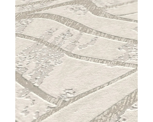 Close-up van een beige vinylbehang met steenmotief