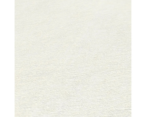 Close-up van een wit spachtelputz behang.