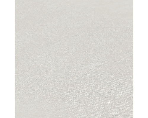 Close-up van een wit behang met een lichte structuur