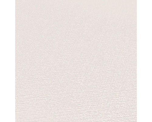 Close-up van een lichtgekleurd, gestructureerd behang