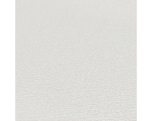 Close-up van een wit behang met fijne textuur