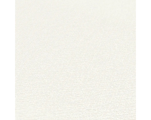 Close-up van een wit behang met fijne structuur