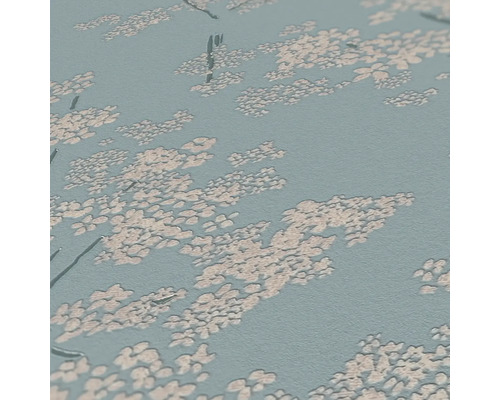 Close-up van een behang met patroon en bloemmotief