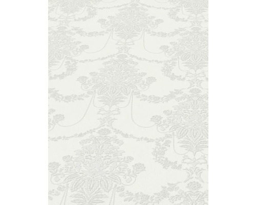 Close-up van een wit behang met bloemmotief