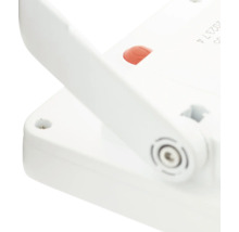 Detailopname van een witte werklamp met rode knop en verstelbare standaard.