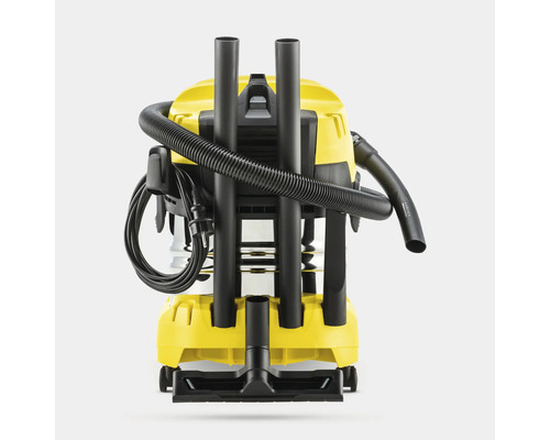 Gele nat- en droogzuiger met slang en accessoires.