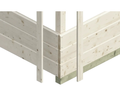 Hoekdetail van een houten huis met mes- en groefverbindingen