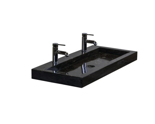 Natuurstenen wastafel met twee kranen