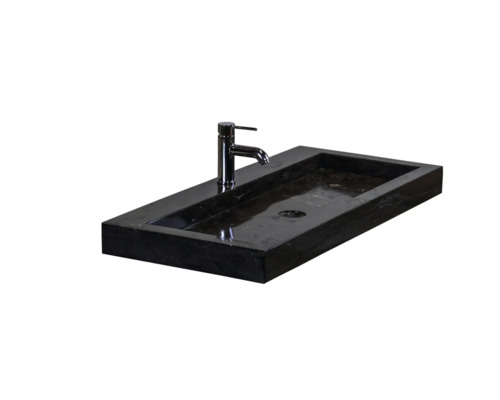 Rechthoekige waskom van steen met kraan