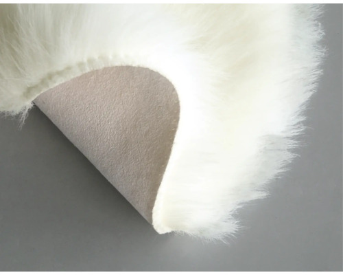 Detailweergave van een tapijt met lange pool en achterkant