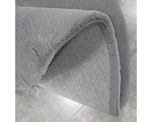 Grijs vloerkleed met geweven achterkant