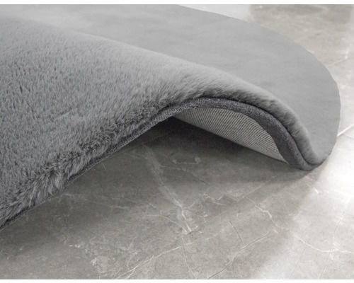 Detailweergave van een rond tapijt met pool