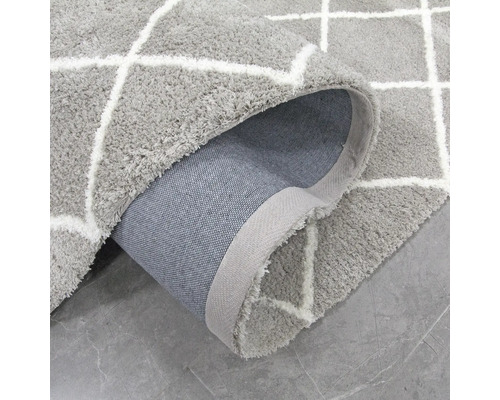 Grijs vloerkleed met geometrisch patroon