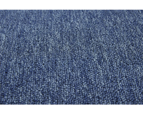 Close-up van een blauw tapijt.