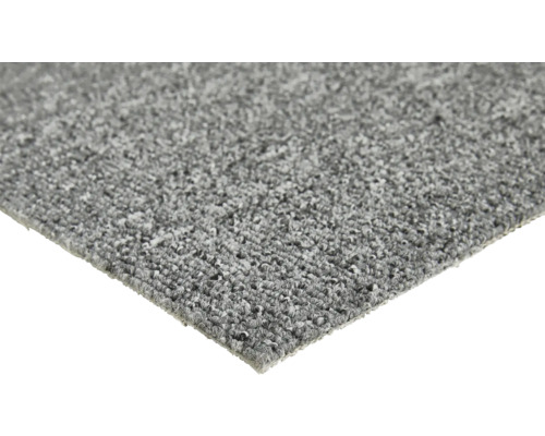 Close-up van een grijs tapijt.