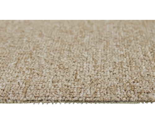 Close-up van een beige tapijt.