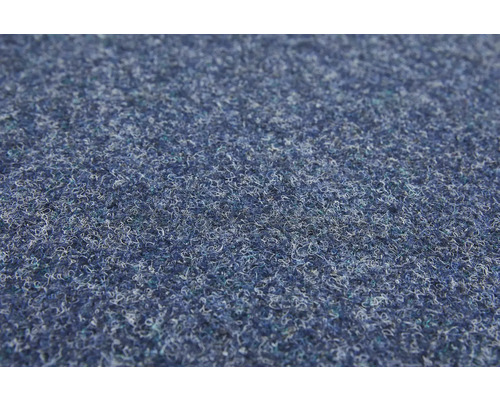 Close-up van een blauwe vloerbedekking met een gestructureerd oppervlak