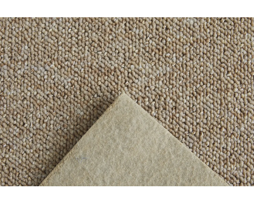 Close-up van een beige tapijt met tapijtrug