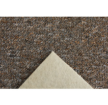 Close-up van een tapijt met meerkleurig motief en textielrug