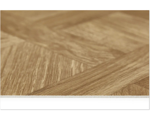 Close-up van een laminaatvloer in visgraatmotief