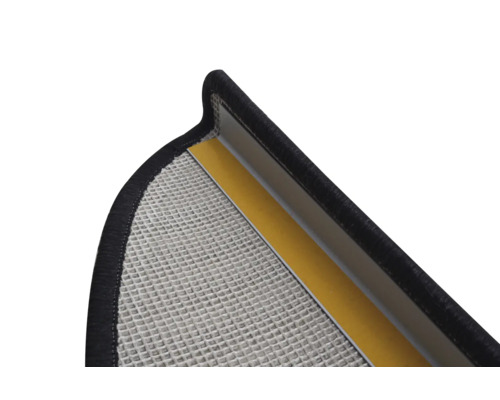 Detailweergave van een deurmat met rasterstructuur, randbescherming en plakstrips.