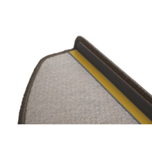 Detail van een trapmat met bevestigingsstrip