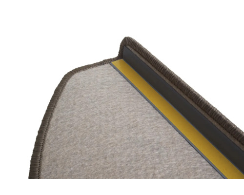 Detail van een trapmat met bevestigingsstrip
