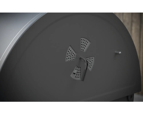 Detailweergave van de ventilatieregelaar van een houtskoolbarbecue