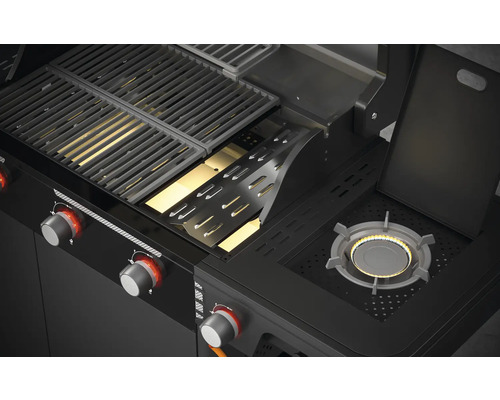 Gedetailleerd zicht op een gasbarbecue met grillrooster en zijbrander