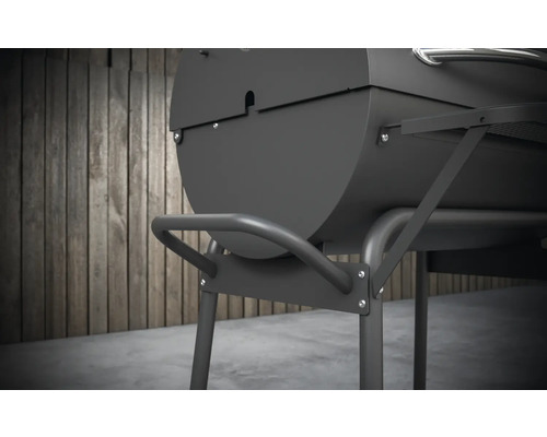 Gedetailleerde weergave van een houtskoolgrill met opbergruimte.